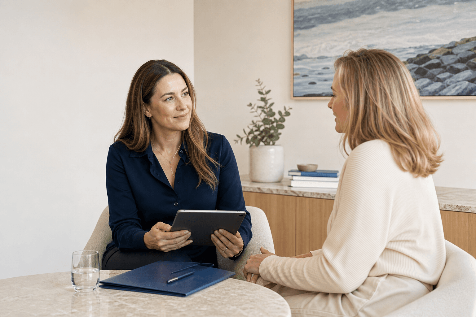 A BeautyBroker coordinator speaking with a prospective client